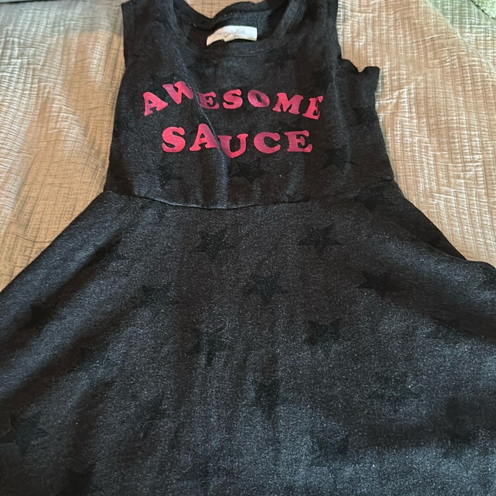 Short sleeve size small skater dress. Star pattern “awesome sauce”